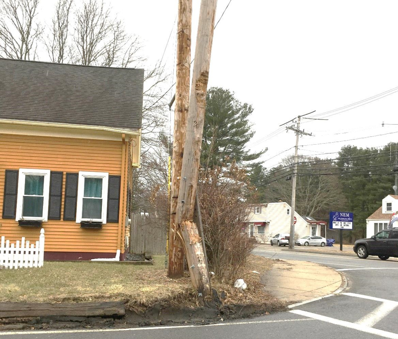 FIGURE 4. Telephone Pole in front of 3 Maple Street
Figure 4 shows the telephone pole on the southeast corner of the intersection, which is frequently damaged by trucks making a right turn onto Maple Street from Route 126 northbound.
FIGURE 4. Telephone Pole in front of 3 Maple Street
Figure 4 shows the telephone pole on the southeast corner of the intersection, which is frequently damaged by trucks making a right turn onto Maple Street from Route 126 northbound.
